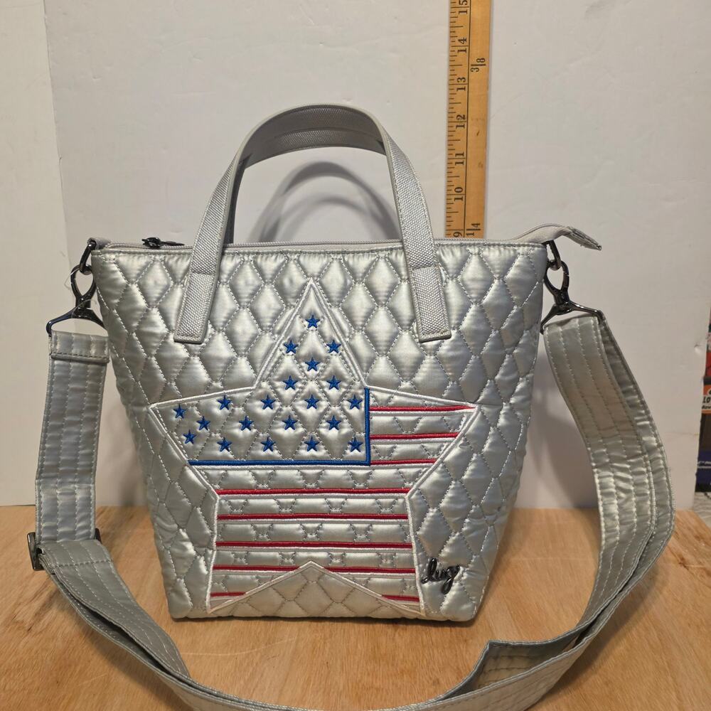 NWOT Lug Metallic Silver Quilted cross-body, embroidered American flag Star